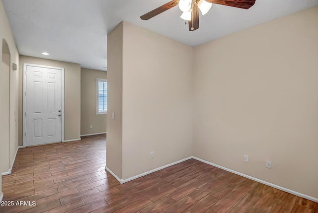 spare room with ceiling fan