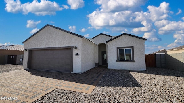 view of front of home featuring a garage