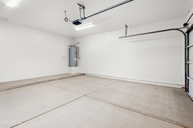 garage featuring a garage door opener and electric water heater