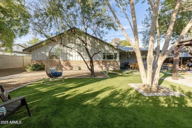 exterior space featuring a playground and a lawn