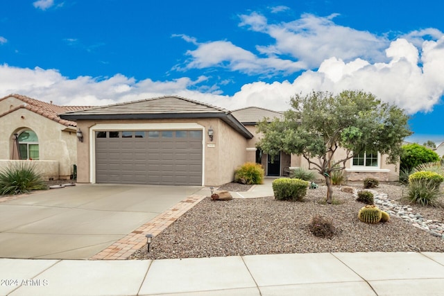 view of front of property featuring a garage