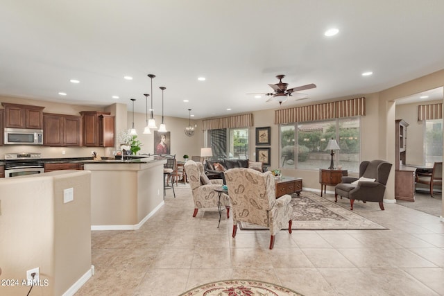 tiled living room featuring ceiling fan