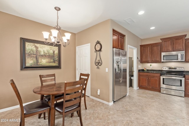 dining room with a chandelier