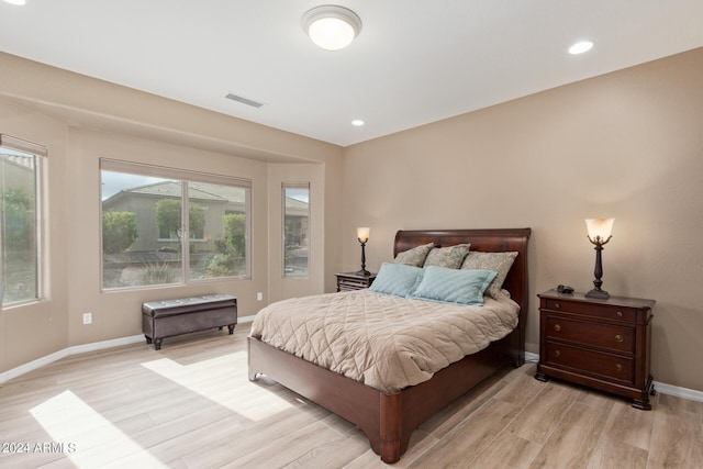 bedroom with light hardwood / wood-style flooring