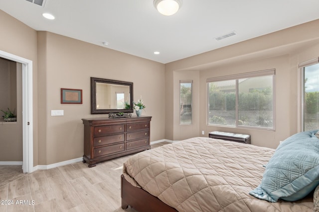 bedroom with light hardwood / wood-style floors