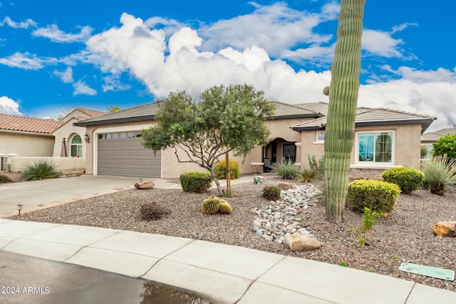 view of front of property featuring a garage