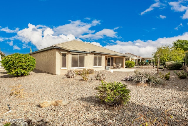 rear view of house with a patio area