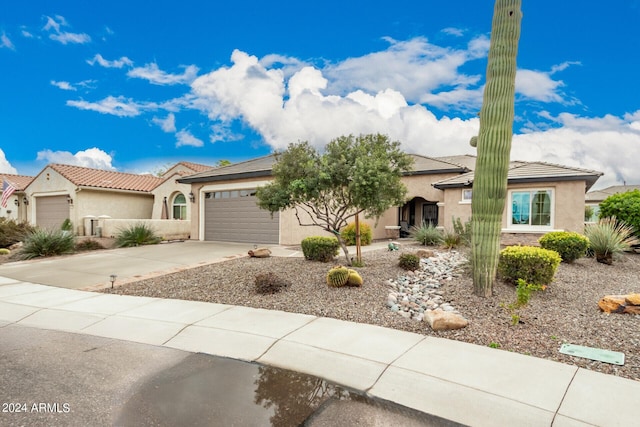 view of front of property featuring a garage