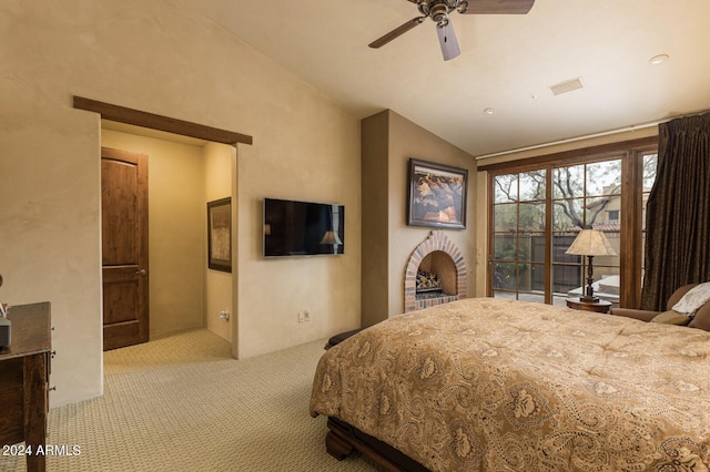 carpeted bedroom featuring lofted ceiling and ceiling fan