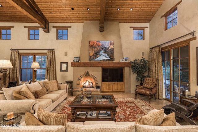 living room featuring beam ceiling, wooden ceiling, and high vaulted ceiling