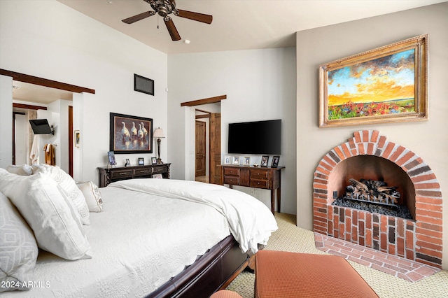 carpeted bedroom with lofted ceiling and ceiling fan