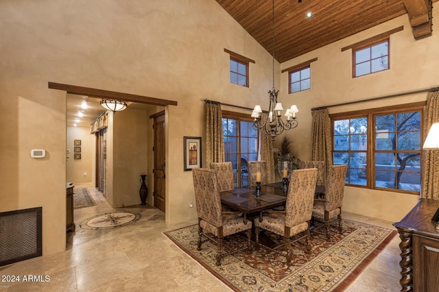 dining space with wood ceiling, high vaulted ceiling, tile patterned flooring, and a notable chandelier