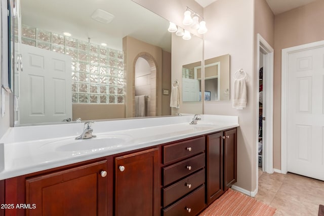 bathroom with vanity and tile patterned floors