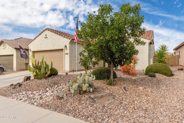 view of front of property with a garage