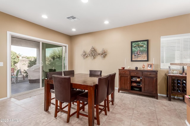 dining room with light tile patterned floors