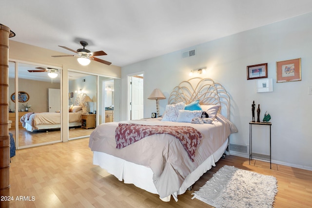 bedroom featuring hardwood / wood-style floors and ceiling fan