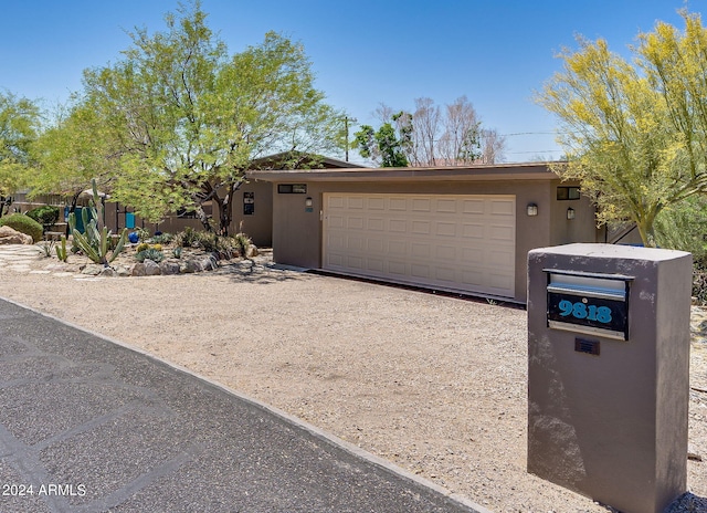 view of front of home with a garage