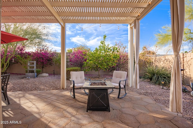 view of patio / terrace featuring an outdoor fire pit and a pergola