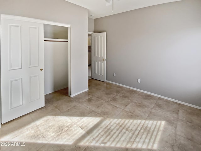 unfurnished bedroom with a closet and light tile patterned floors