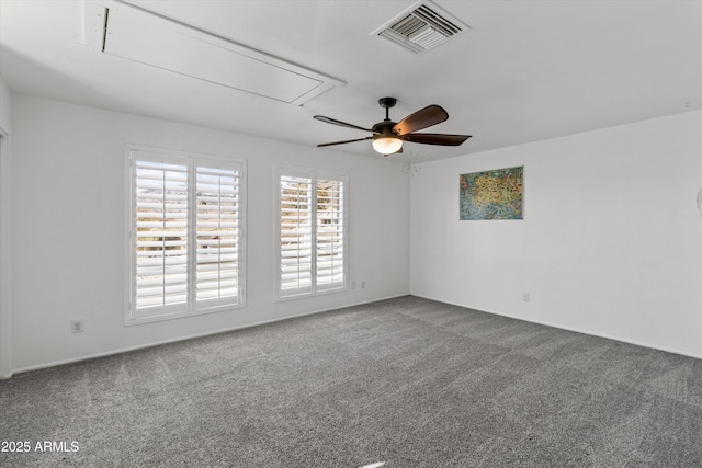 empty room featuring carpet and ceiling fan