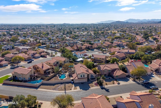 bird's eye view with a mountain view