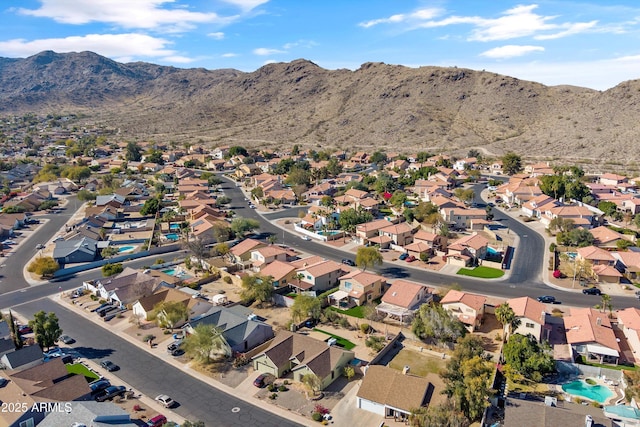 bird's eye view with a mountain view