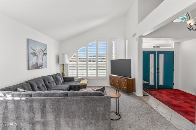 tiled living room featuring lofted ceiling