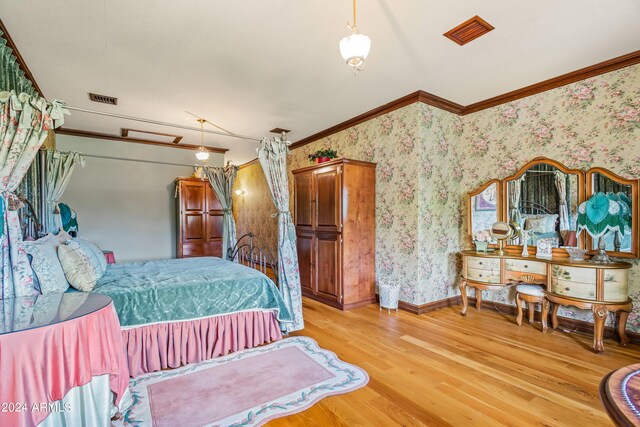 bathroom with ornamental molding, vanity, hardwood / wood-style floors, and shower with separate bathtub