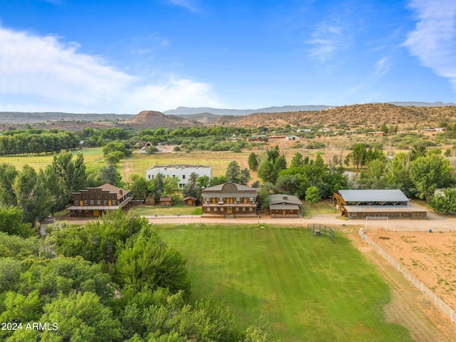 aerial view with a mountain view and a rural view