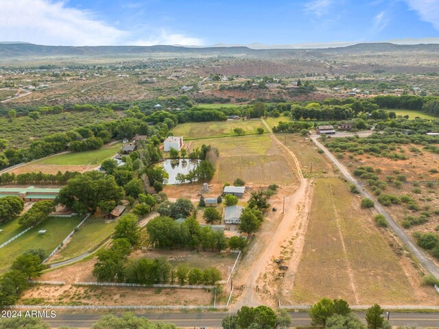 bird's eye view with a mountain view and a rural view