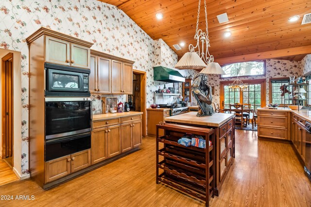 stairs featuring crown molding, hardwood / wood-style flooring, and a notable chandelier