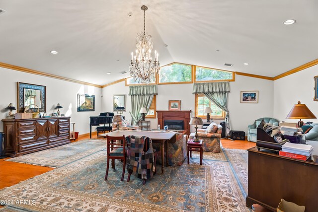 interior space with a fireplace, crown molding, and hardwood / wood-style flooring