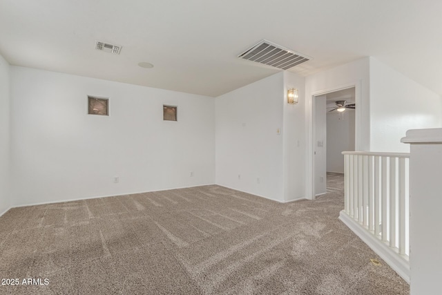 16215 W Durango St, Goodyear, AZ 85338 - empty room with carpet and ceiling fan