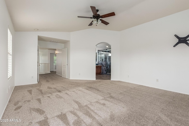 16215 W Durango St, Goodyear, AZ 85338 - unfurnished living room featuring ceiling fan, carpet flooring, and lofted ceiling