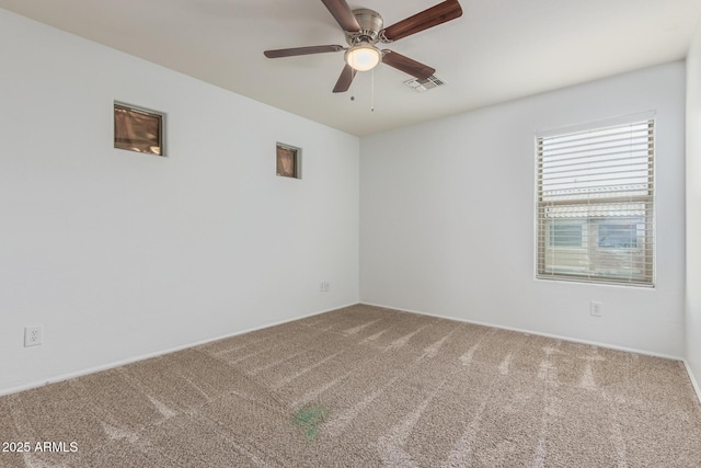 16215 W Durango St, Goodyear, AZ 85338 - carpeted empty room featuring a ceiling fan and baseboards