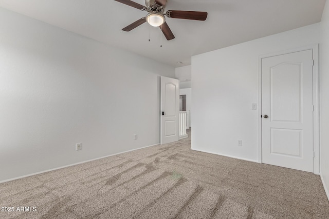 16215 W Durango St, Goodyear, AZ 85338 - unfurnished bedroom featuring carpet floors, baseboards, and a ceiling fan