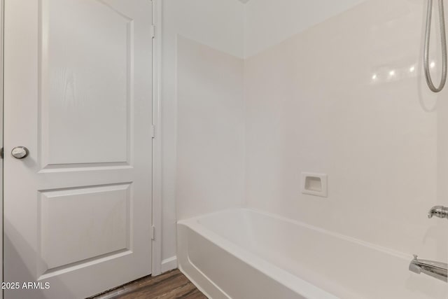 16215 W Durango St, Goodyear, AZ 85338 - full bathroom with wood finished floors and shower / washtub combination