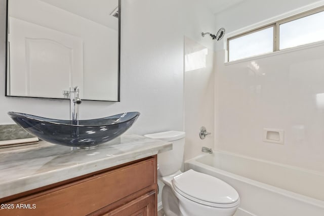 16215 W Durango St, Goodyear, AZ 85338 - bathroom featuring shower / washtub combination, toilet, and vanity