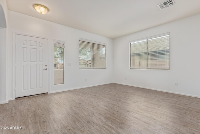 16215 W Durango St, Goodyear, AZ 85338 - foyer entrance with wood finished floors and baseboards
