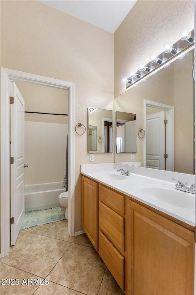 5212 S Monte Vista St, Chandler, AZ 85249 - bathroom with toilet, double vanity, tile patterned floors, and  shower combination