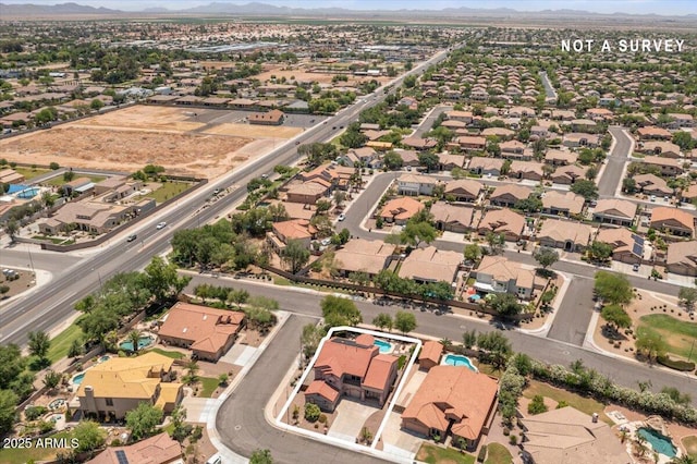 5212 S Monte Vista St, Chandler, AZ 85249 - aerial view of property's location with property parcel outlined, a mountainous background, and nearby suburban area