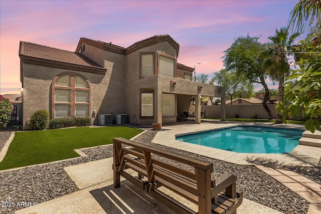 5212 S Monte Vista St, Chandler, AZ 85249 - pool at dusk featuring a patio and central AC