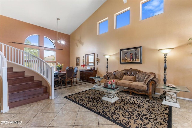 5212 S Monte Vista St, Chandler, AZ 85249 - living area with a high ceiling, stairs, tile patterned flooring, and plenty of natural light