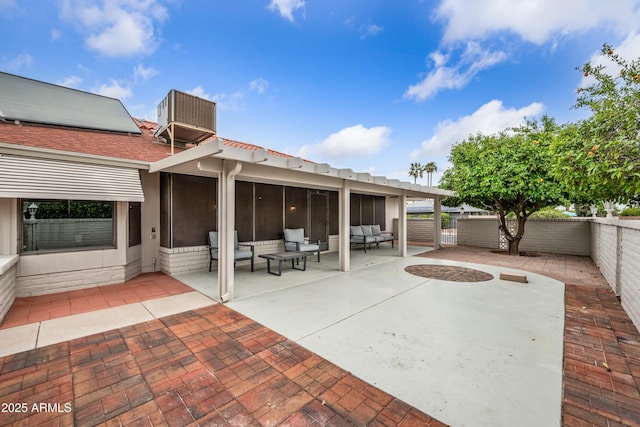 view of patio / terrace with a fenced backyard and an outdoor hangout area
