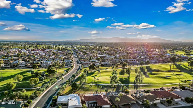 bird's eye view featuring a residential view, a mountain view, and view of golf course