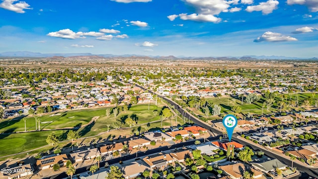 bird's eye view featuring a residential view, a mountain view, and view of golf course