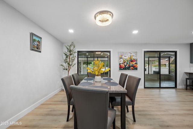 dining area with recessed lighting, baseboards, and light wood-type flooring