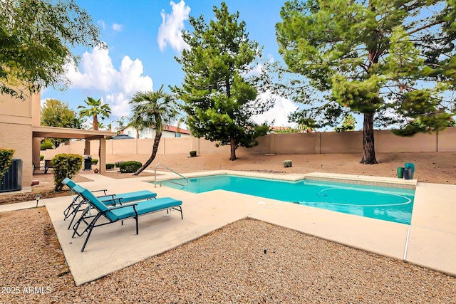 view of swimming pool with a fenced in pool, a patio, and a fenced backyard