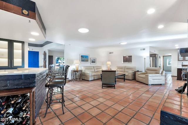 living room featuring tile patterned flooring