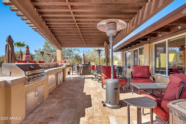 view of patio / terrace featuring an outdoor kitchen and grilling area